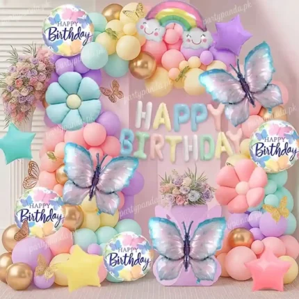 Pastel butterfly and rainbow theme birthday balloon decoration backdrop by partypanda.pk.