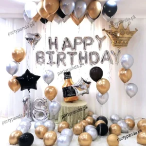 Elegant black and gold 18th birthday balloon decoration setup by partypanda.pk.