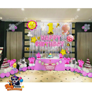 Pink tinsel curtain first birthday balloon decoration backdrop by partypanda.pk.